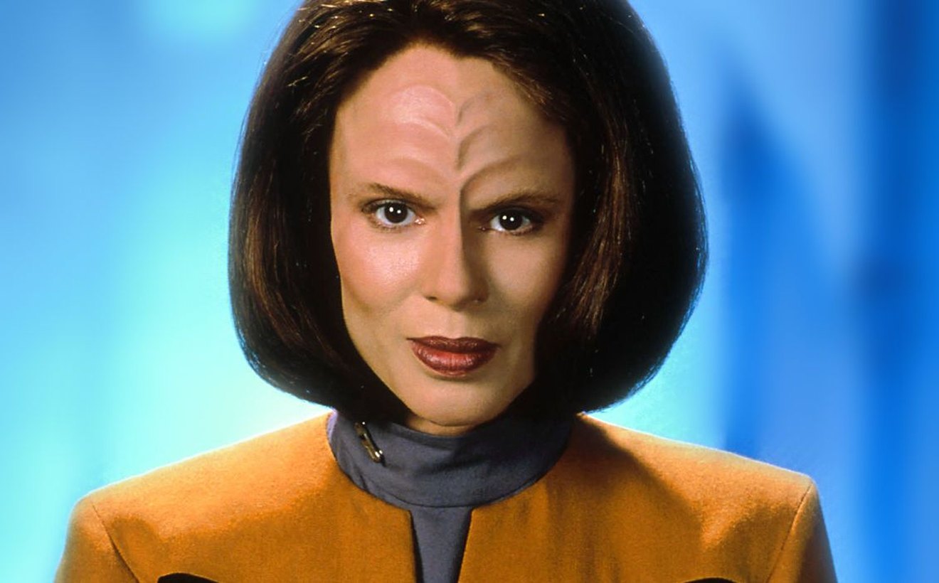 Visual context around The Woman Behind the Mask.